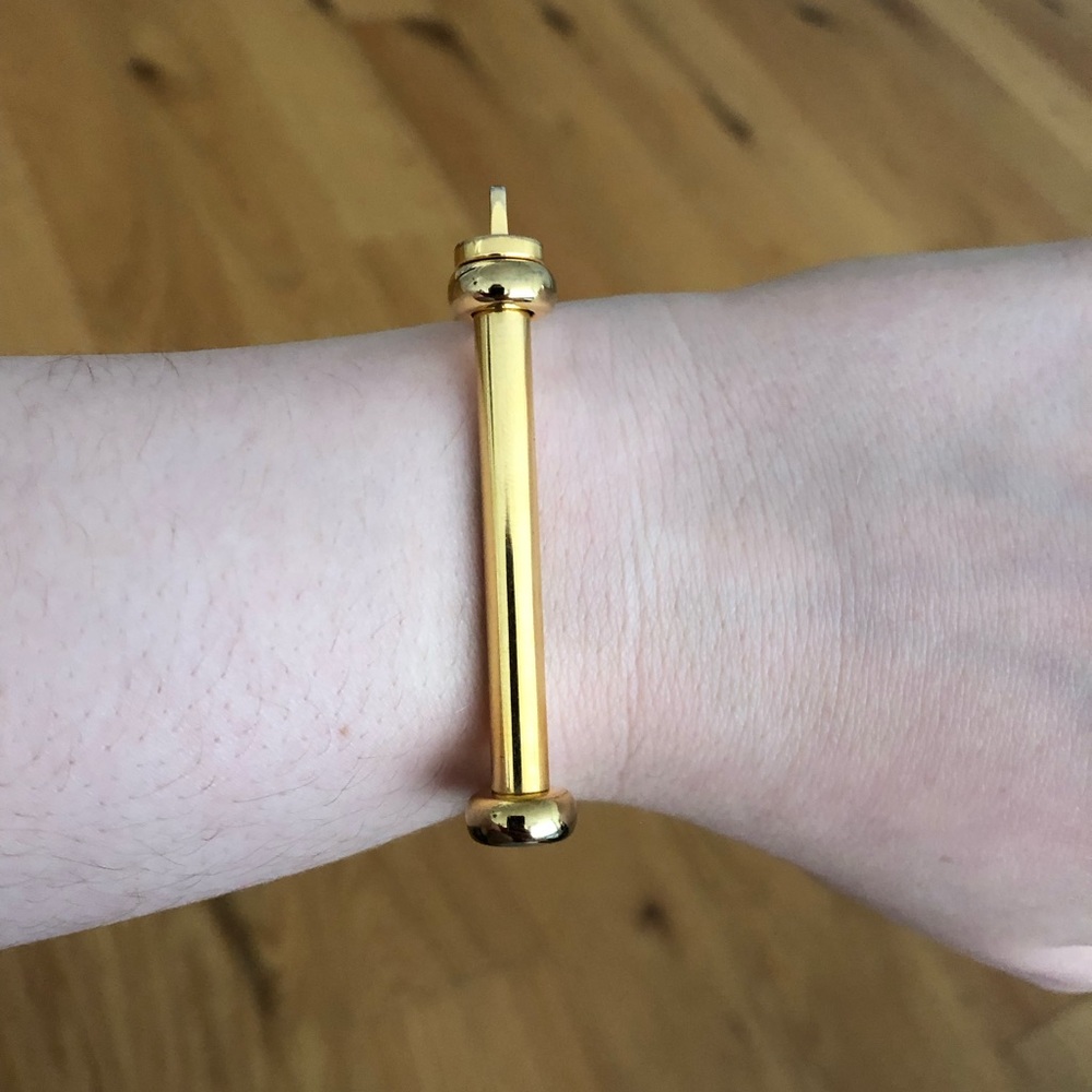 Miansai gold screw cuff.